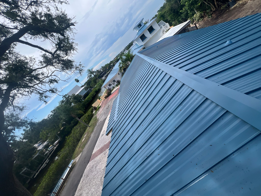 Shingle to standing seam metal photo 1