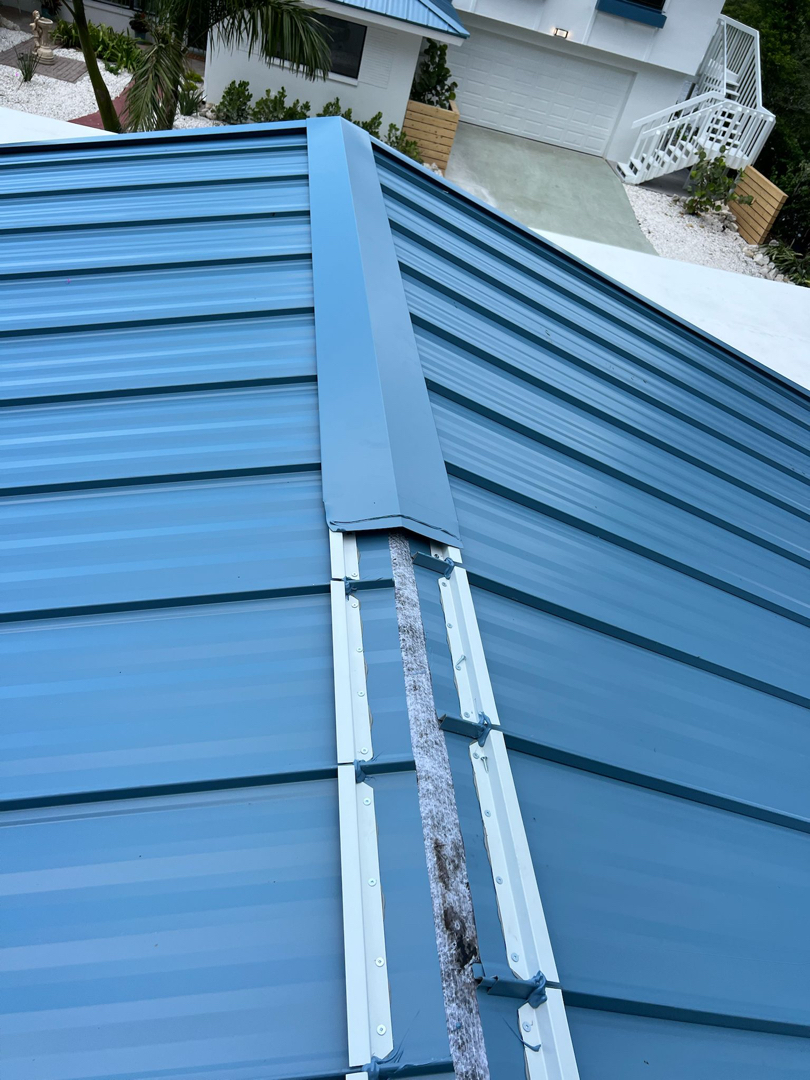 Shingle to standing seam metal photo 3