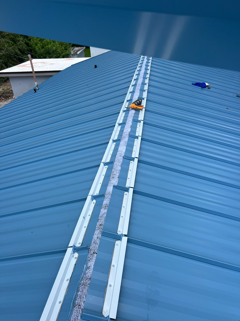 Shingle to standing seam metal photo 2